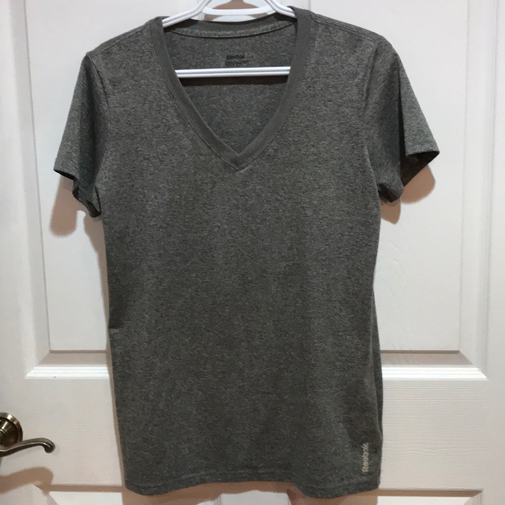 A gray breathable Reebok shirt.